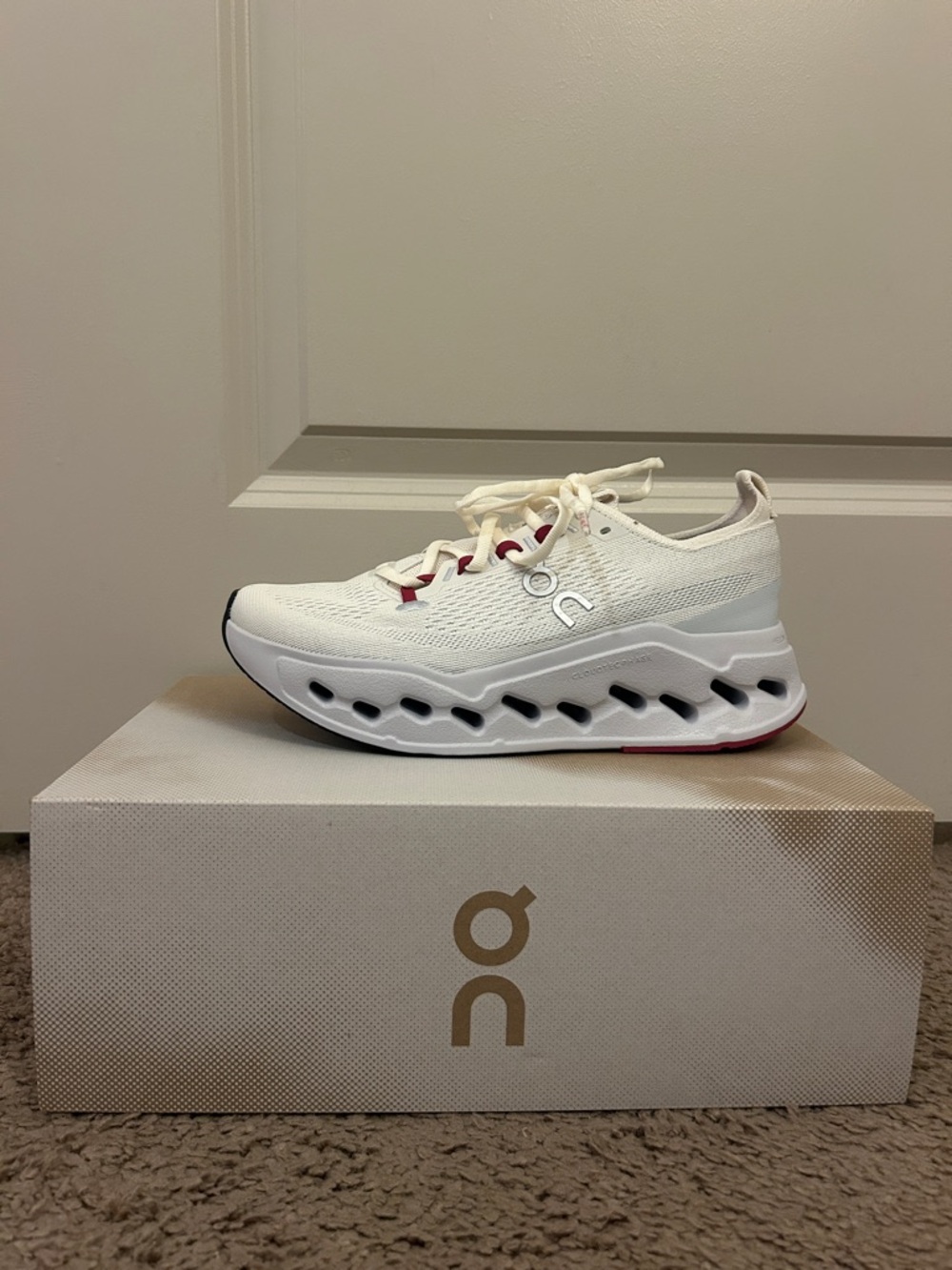 On Running White and Red Cloudsurfer Max Running Shoes